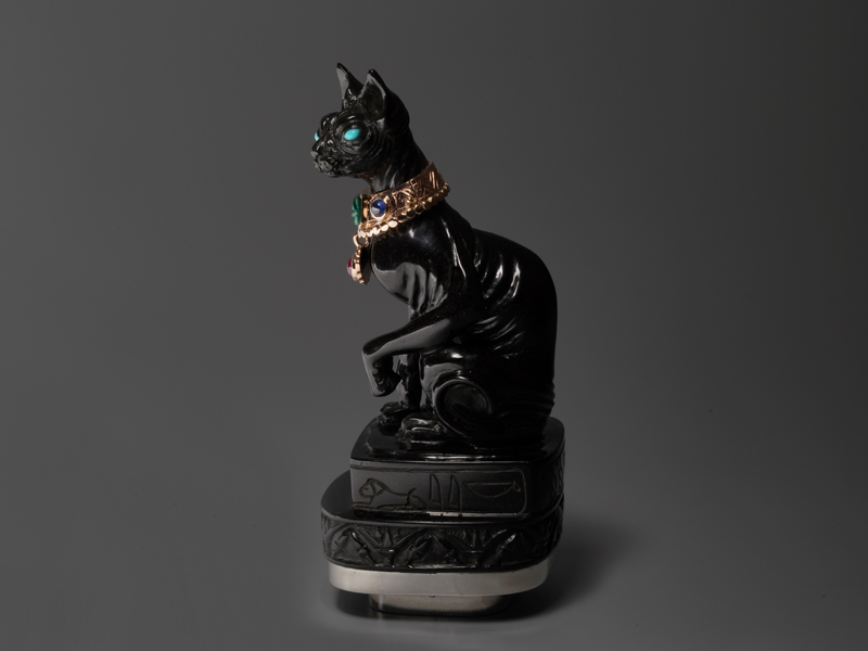 Cat art sculpture with gold jewellery
